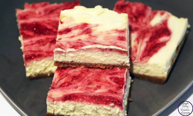 This delicious Raspberry and White Chocolate Cheesecake Slice is easy to make and melts in your mouth!!