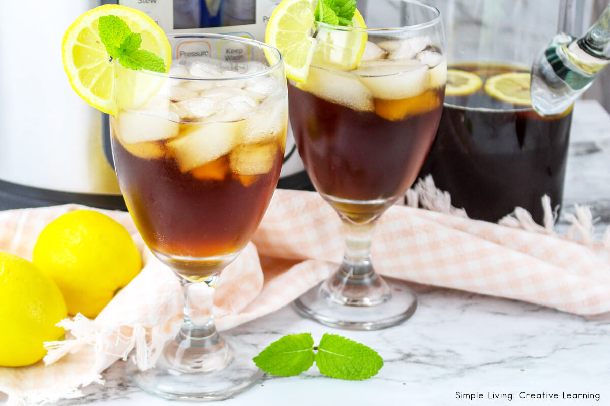 Instant Pot Sweet Tea two tall glasses with lemon slices