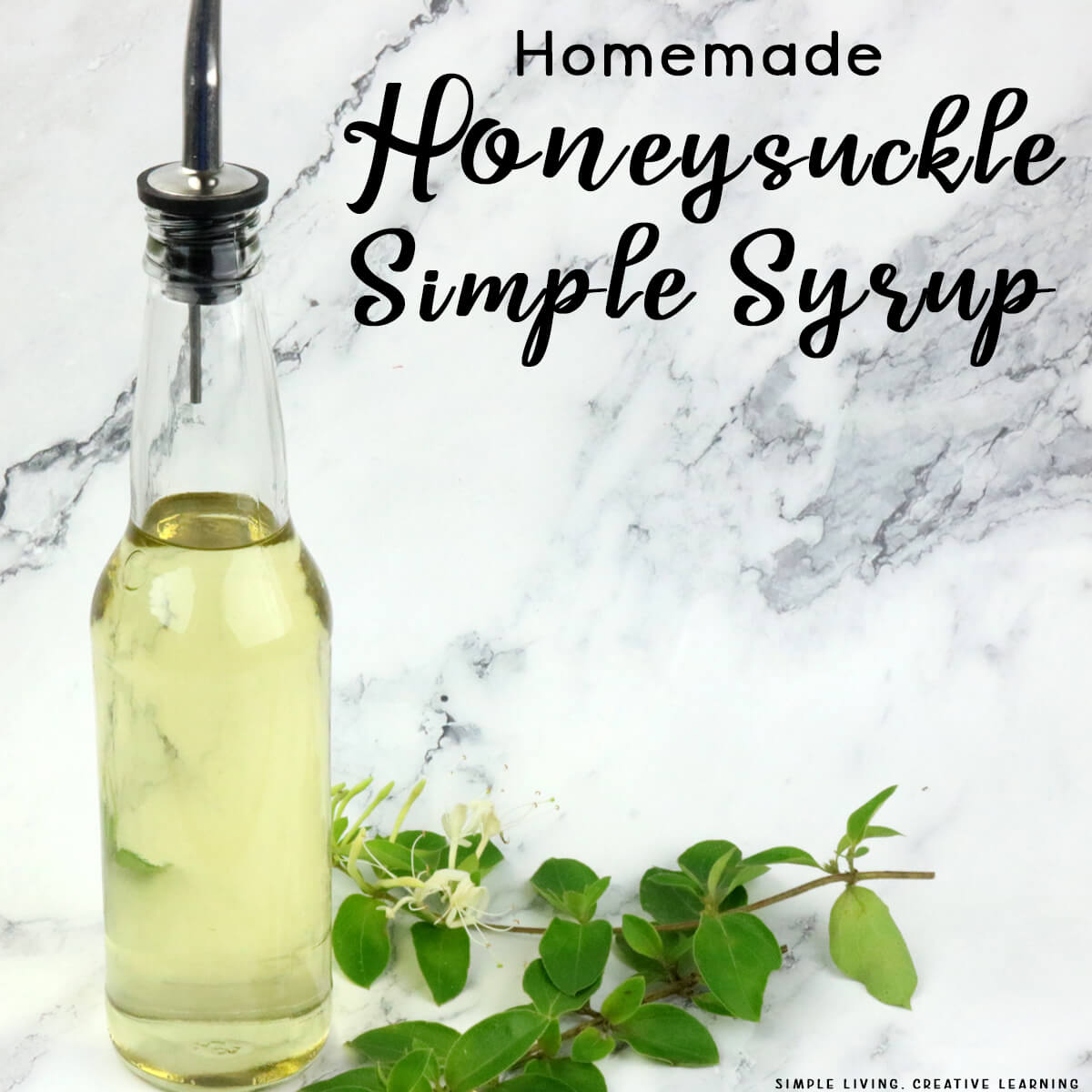 Honeysuckle Simple Syrup in a glass bottle