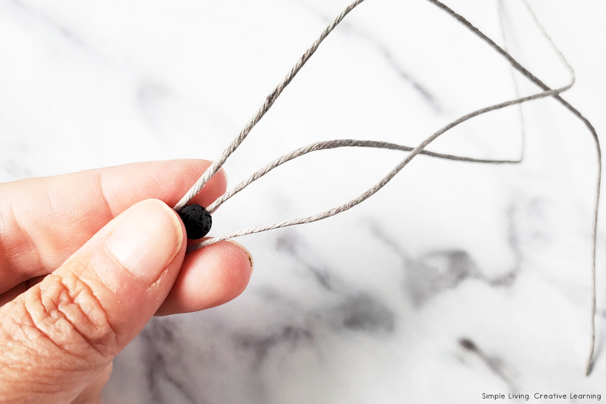 DIY Essential Oil Bead Knot Bracelet lining them up
