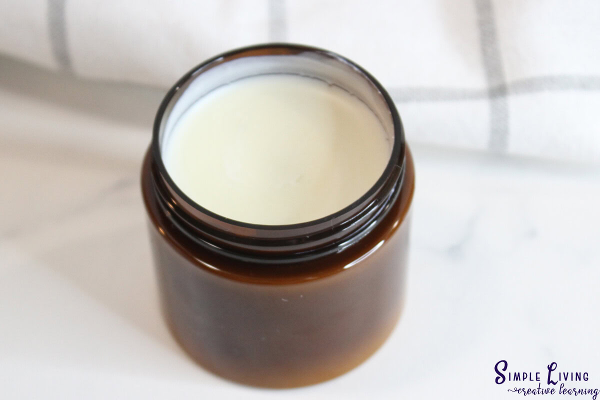 Homemade Natural Sunscreen in an amber glass jar