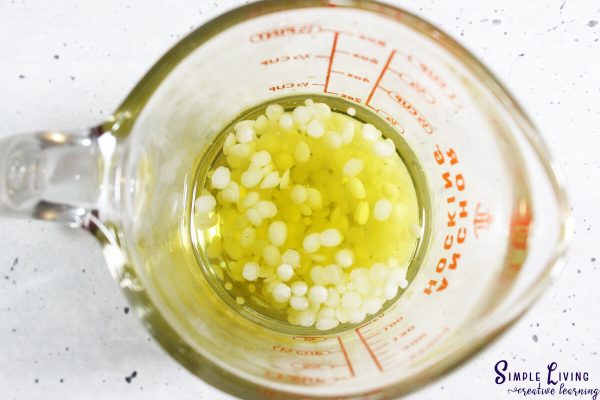 Bug Bite Balm ingredients in a jug