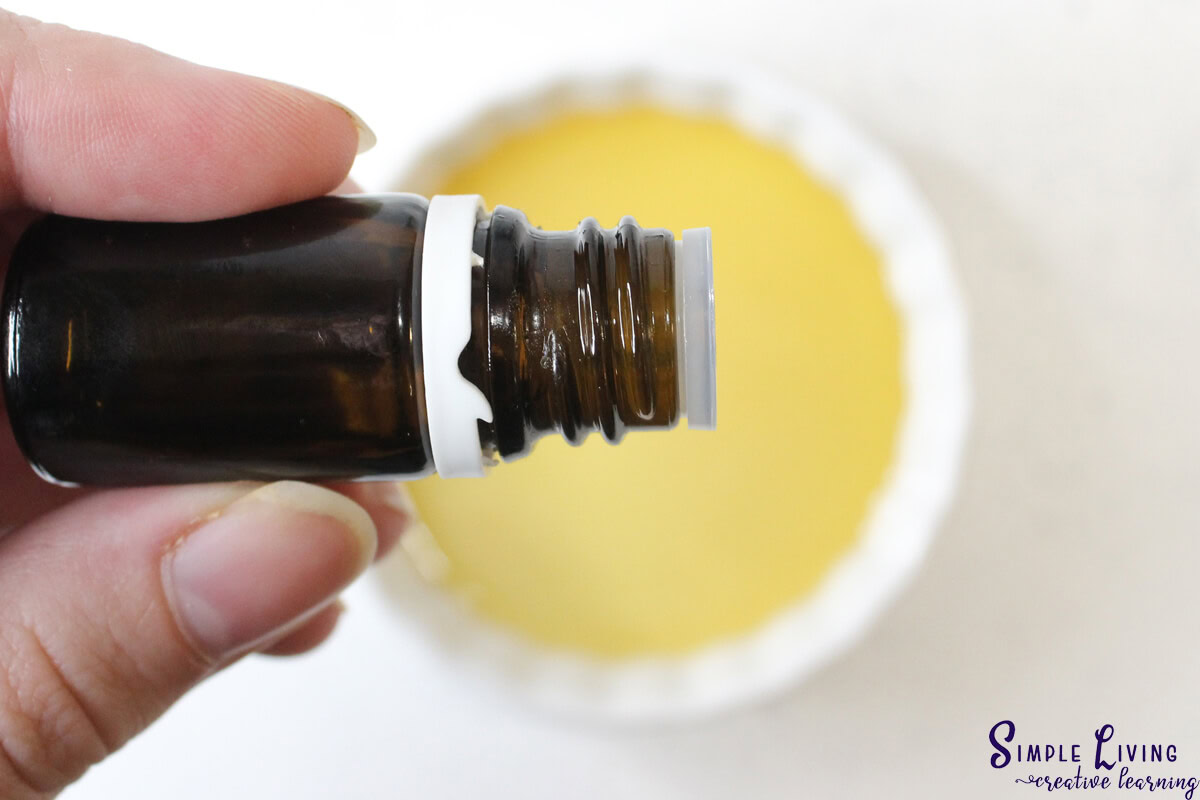 Homemade Coffee Face and Body Scrub mixing essential oils with infused oil