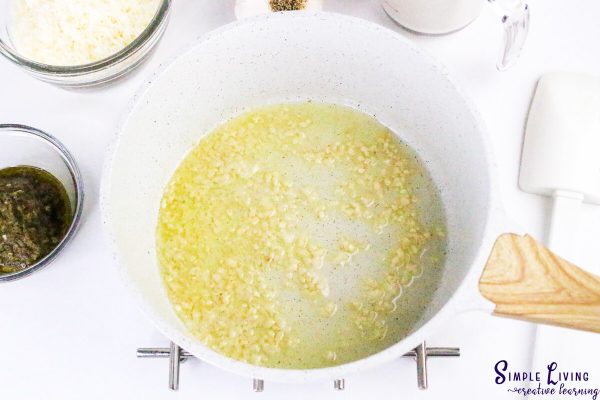 Homemade Alfredo Pesto Sauce cooking the garlic