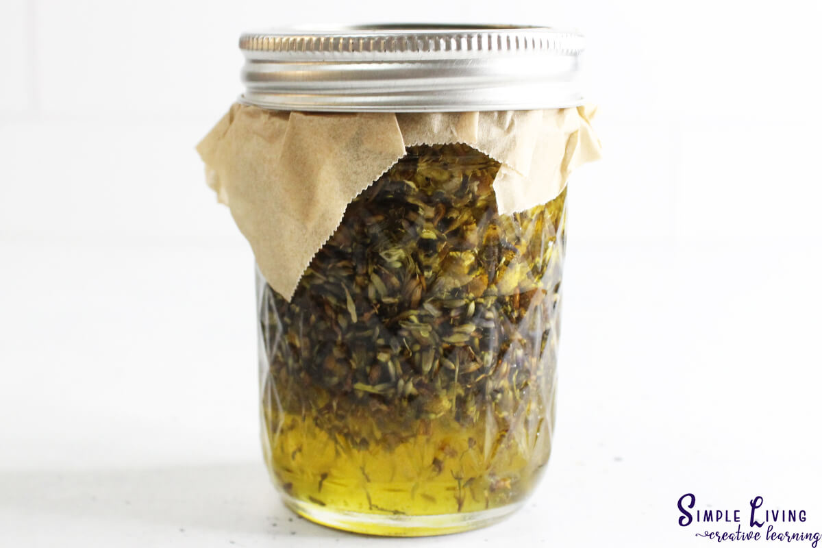 Homemade Natural Sleep Salve adding the lid ready to store for infusing