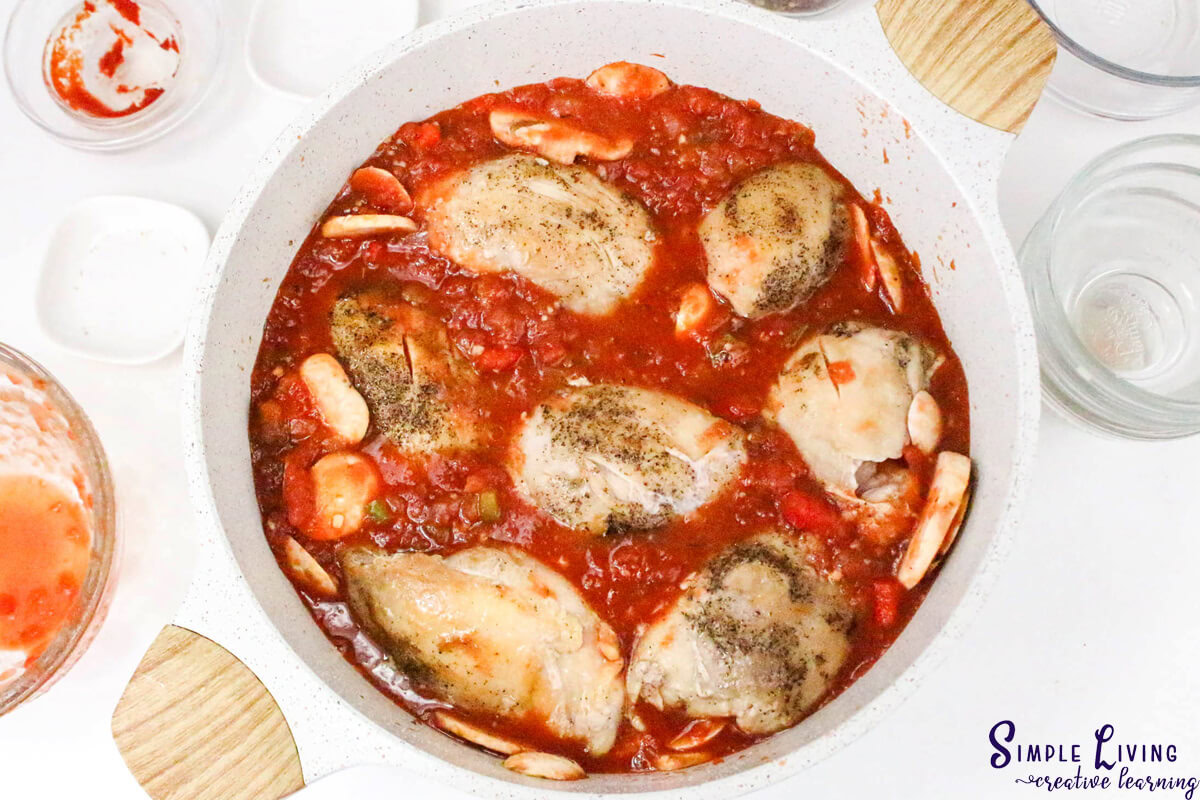 Dutch Oven Chicken Cacciatore adding chicken back into pot