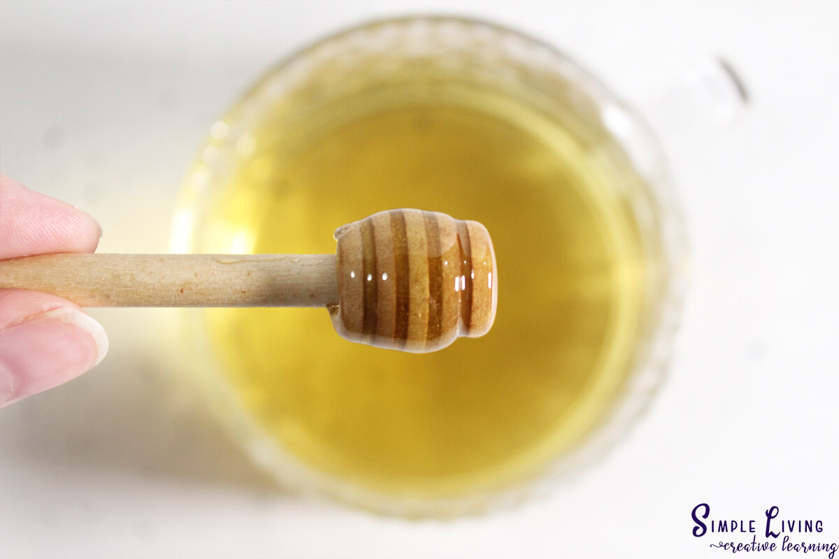 Bee Balm Tea adding honey