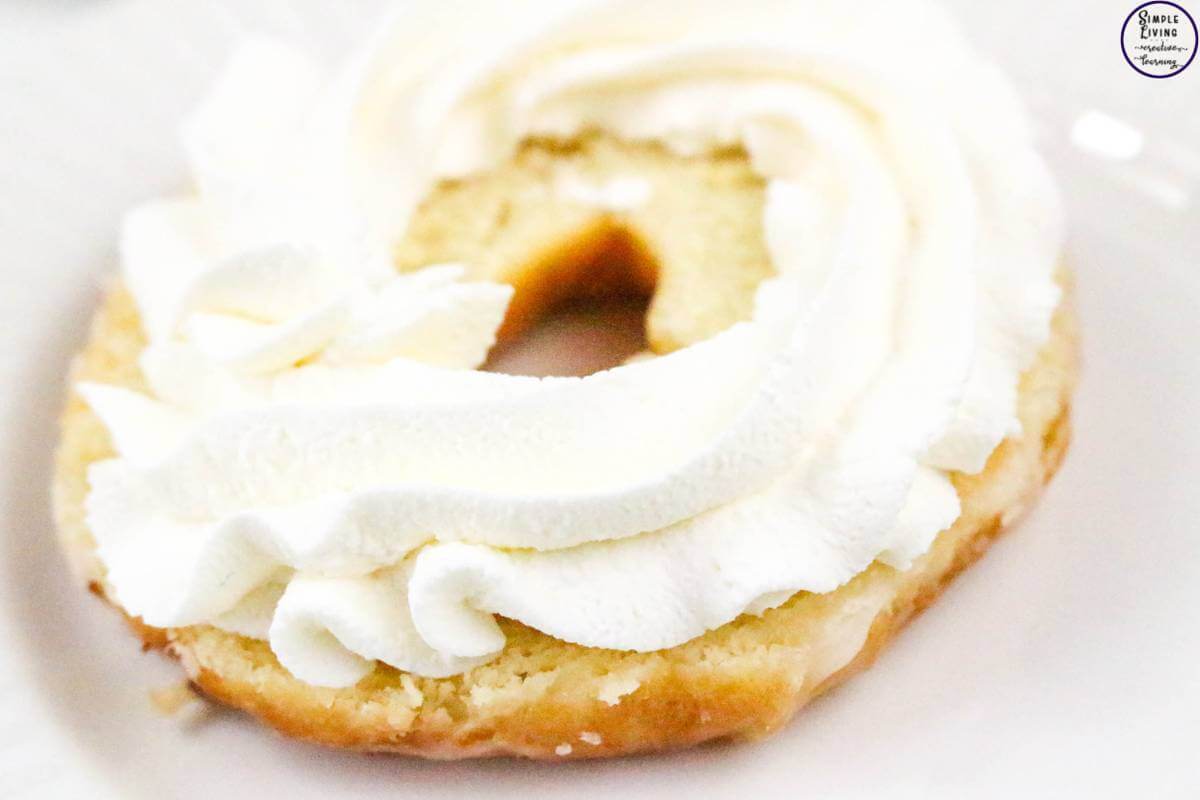 Easy Strawberry Shortcake Donuts adding the cream to the base