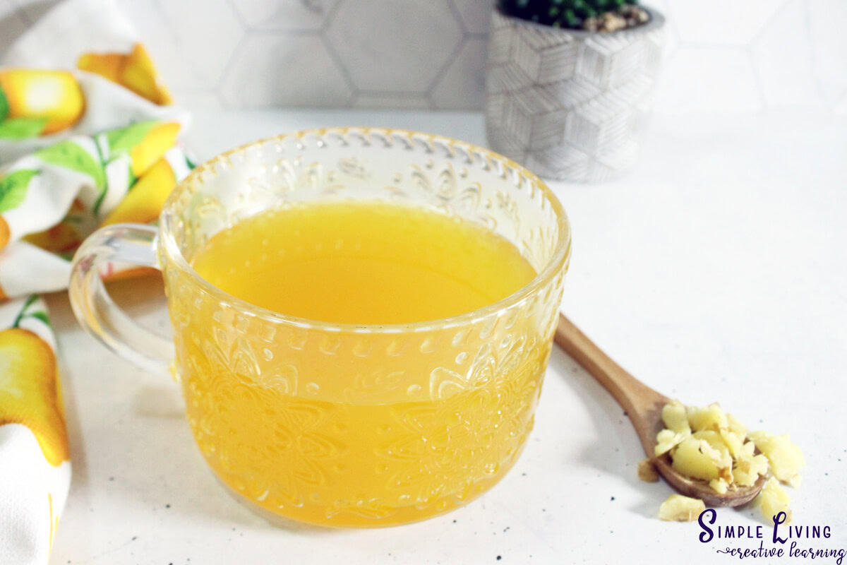 Immune Boosting Tea in a cup with a spoon next to it