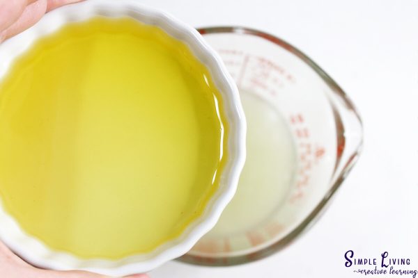 Homemade Tallow Sugar Scrub adding the carrier oil