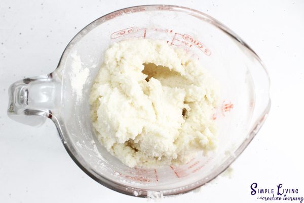 Homemade Tallow Sugar Scrub adding the sugar