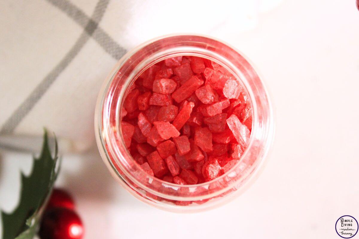 Homemade Candy Cane Bath Salts looking down on jar