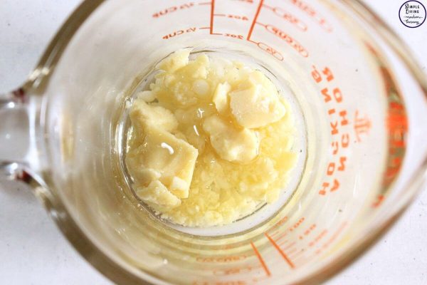 Homemade Coffee Lip Balm melting the infused oil, cocoa butter and beeswax