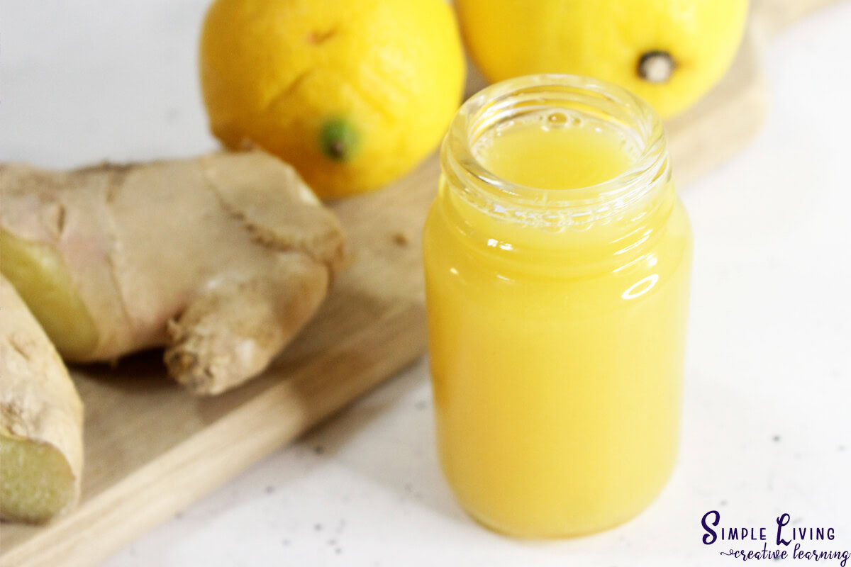 Immunity Shots With Lemon, Ginger and Turmeric looking down on open jar