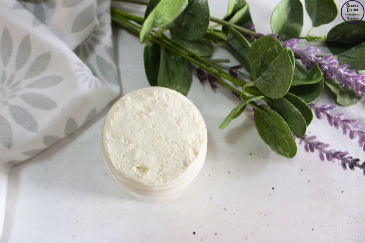 Homemade Hand Cream looking down on a jar full of homemade hand cream