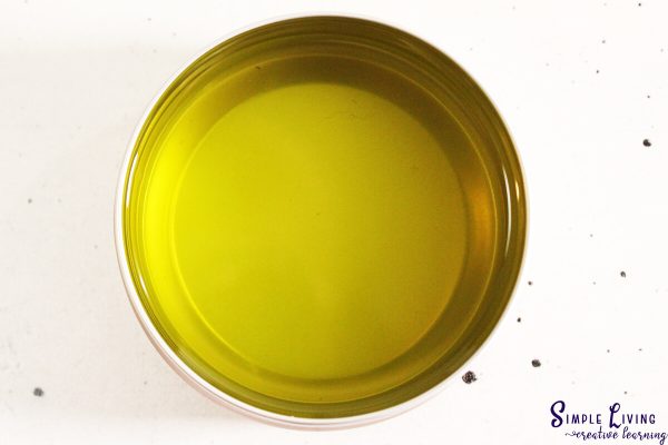 Herbal Antibiotic Ointment pouring into containers