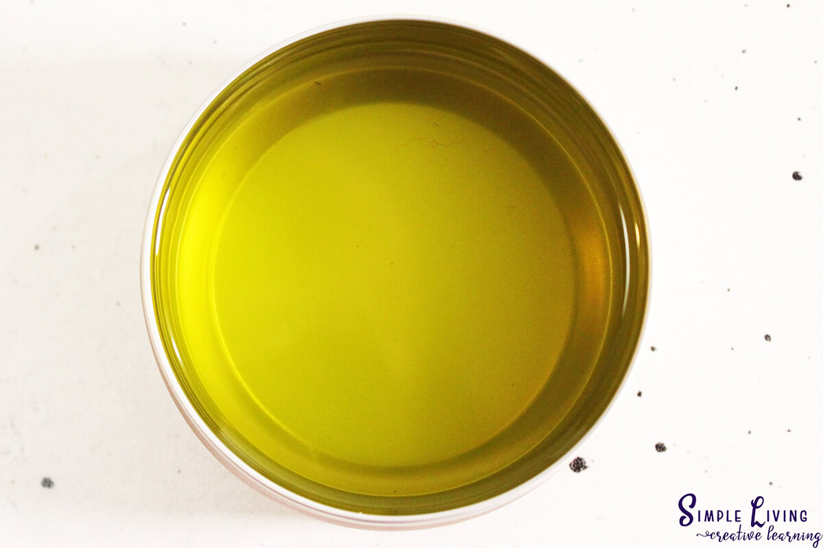 Herbal Antibiotic Ointment pouring into containers