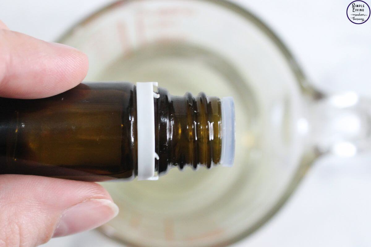 Homemade Tallow Candles adding essential oils which are optional