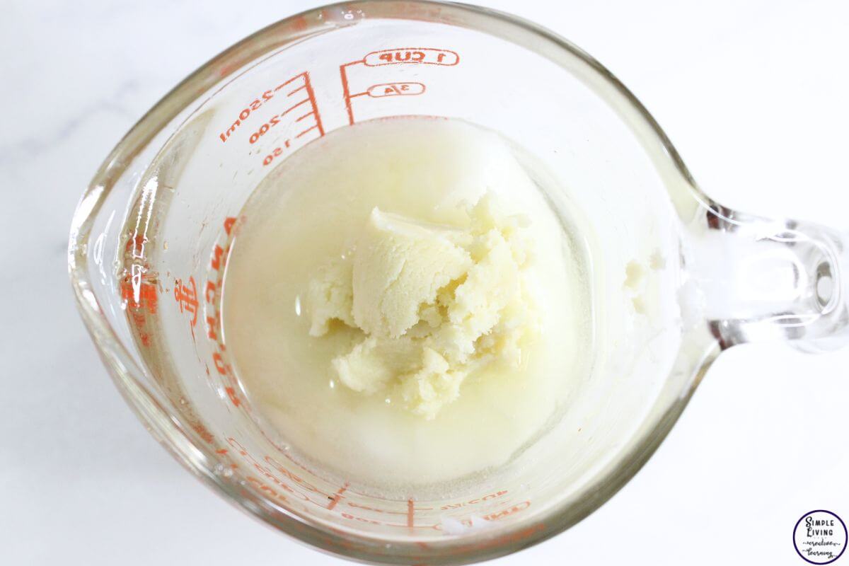 Homemade Tallow Lotion melting the tallow and shea butter together