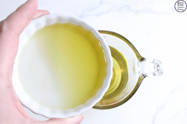 Homemade Tallow Lotion adding the carrier oil