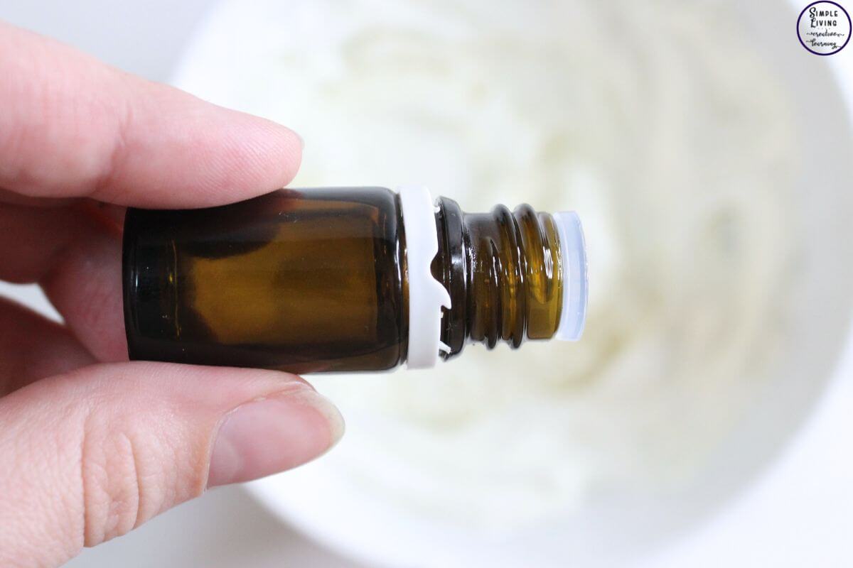 Homemade Tallow Lotion adding essential oils
