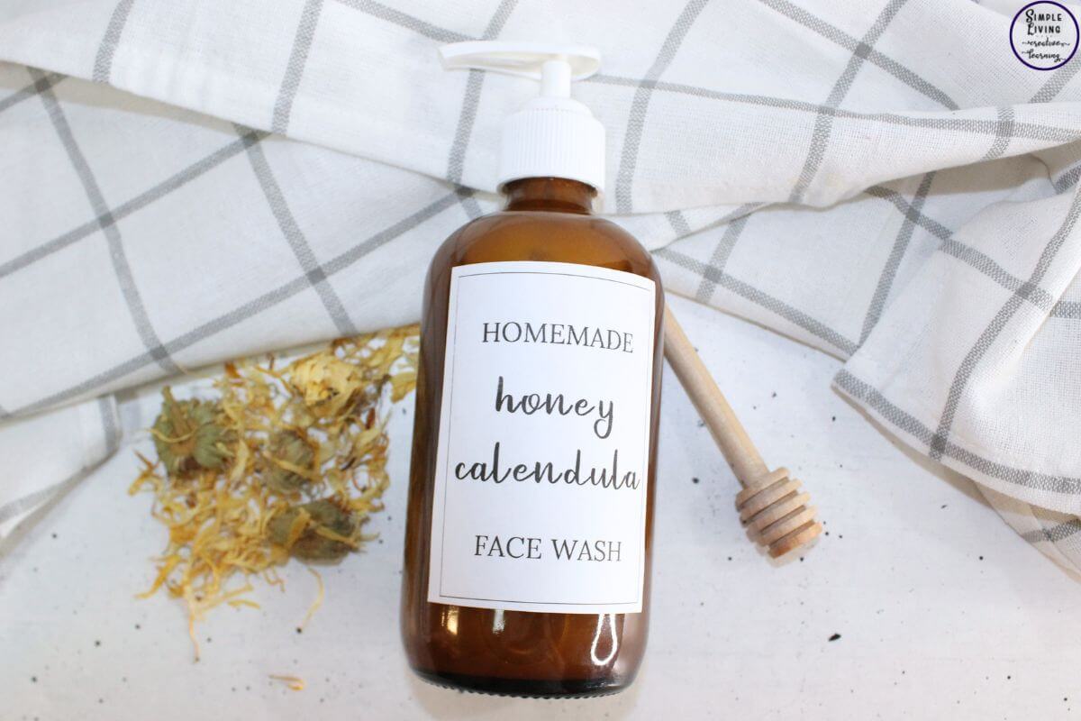 How to Grow, Harvest and Dry Calendula Homemade Calendula Lip Balm How to Make Calendula Oil How to Make Healing Calendula Salve Calendula and Chamomile Bath Bombs Homemade Calendula Soap Calendula Bath Bombs Make a Herb Infused Oil Calendula Fizzing Bath Powder bottle laying on tea towel ready to use