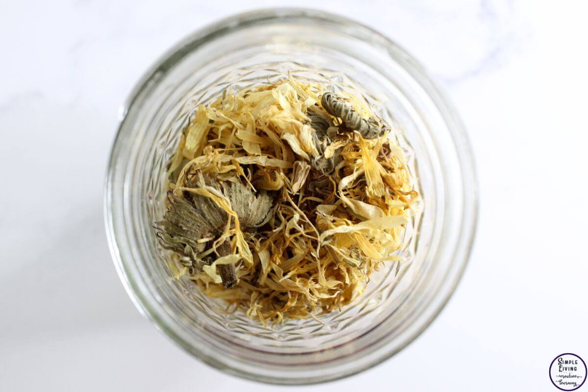 Calendula Facial Cleanser with Honey add calendula flowers to jar to make infused oil