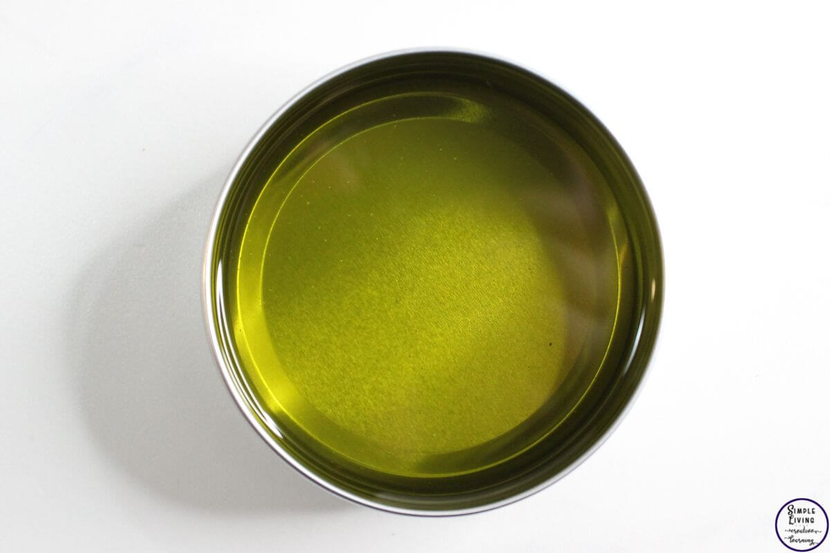 Homemade Oregano Salve poured into container