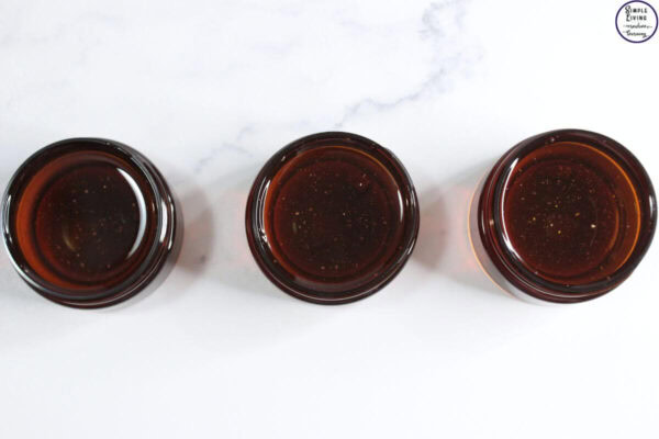 Rose Tallow Face Cream pouring into containers