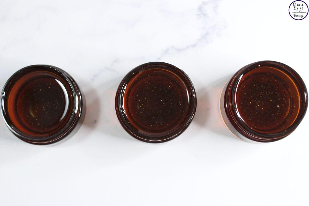 Rose Tallow Face Cream pouring into containers
