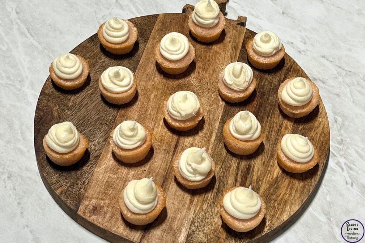 2 Ingredient Cupcakes iced on a wooden tray
