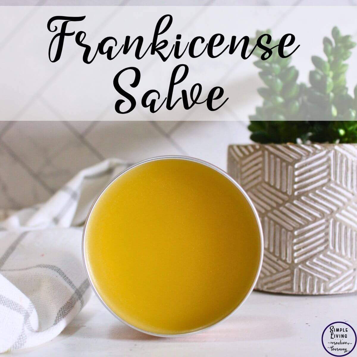 Homemade Frankincense Salve in a tin
