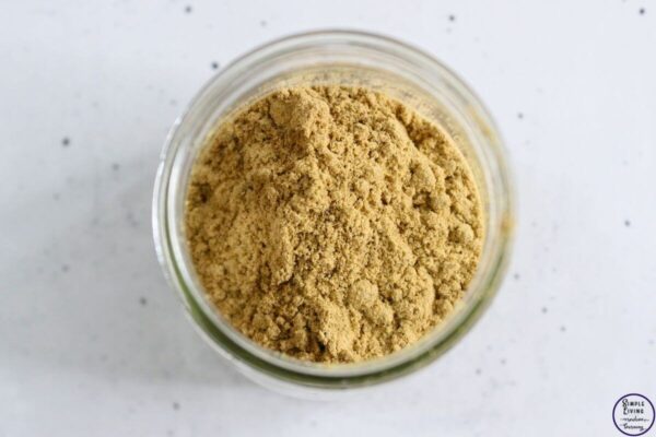Chamomile Ginger Honey for Relieving Headaches adding the powders
