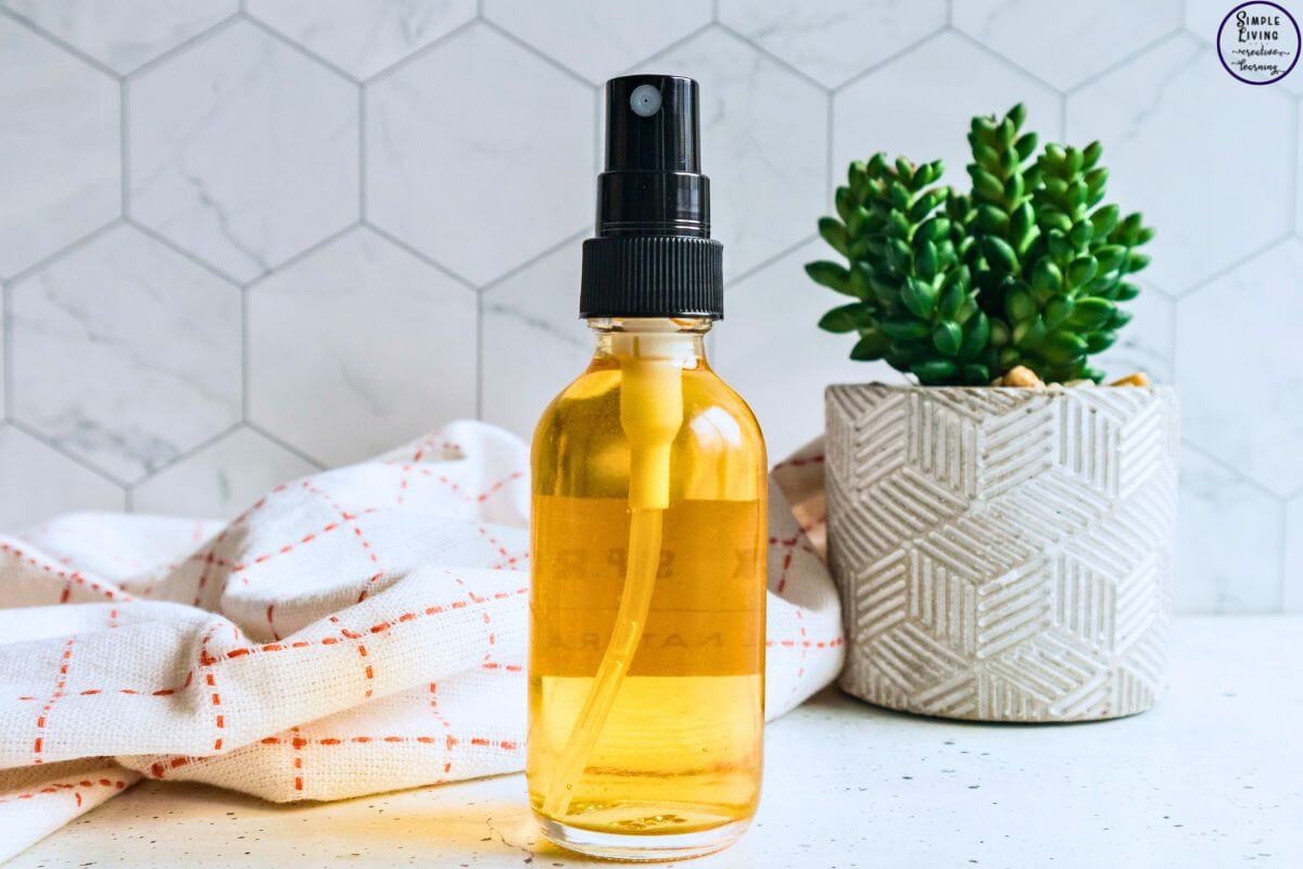 Homemade Tick Spray in a spray bottle ready to use