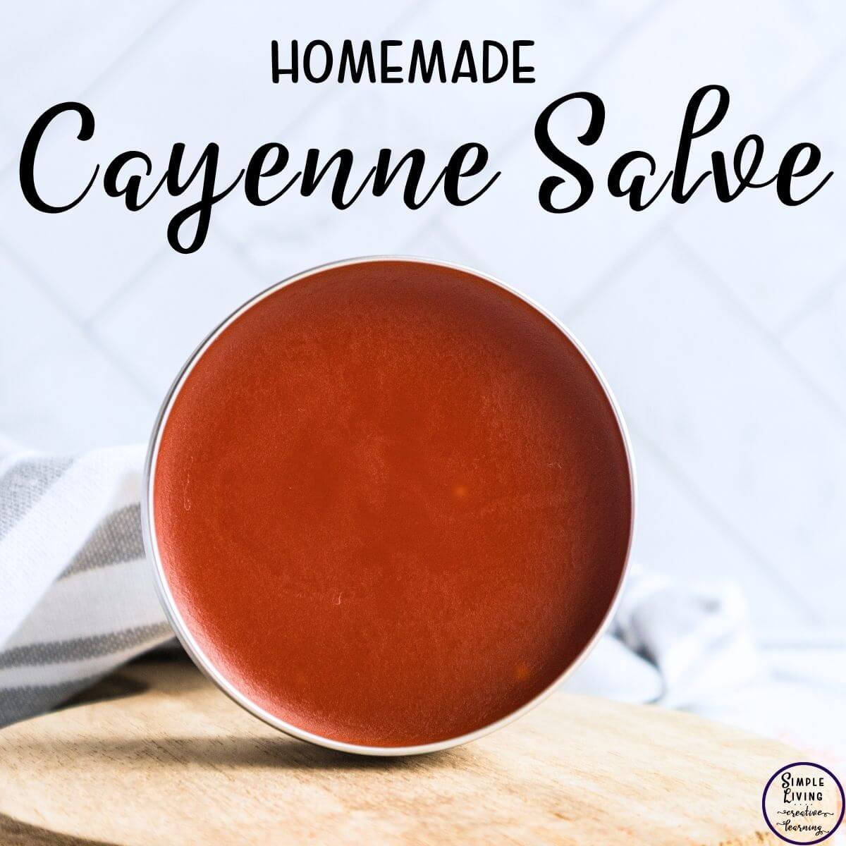 homemade cayenne salve in a tin