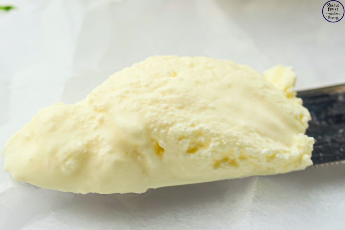 Homemade Cream Cheese Recipe on a knife