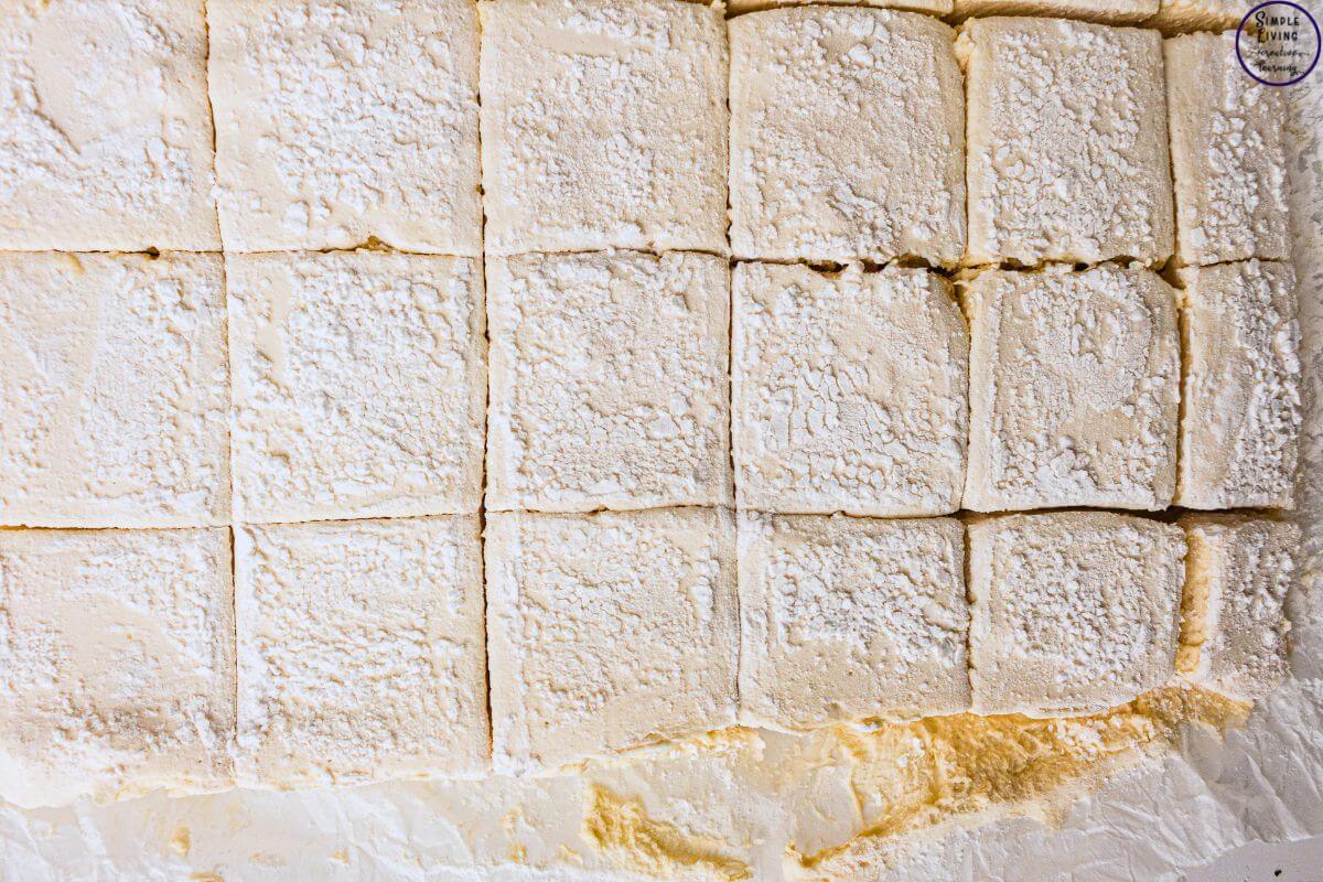 Homemade Vanilla Marshmallows cutting into squares