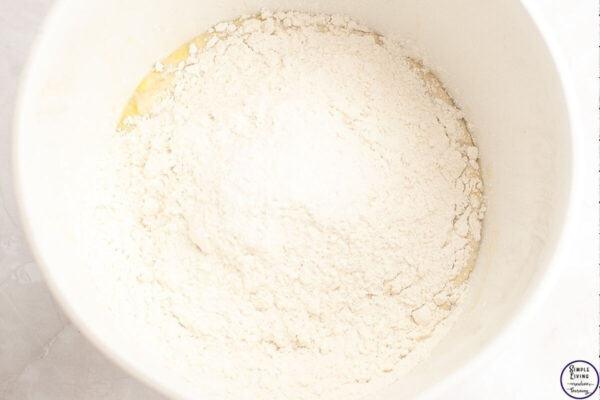 Overnight Sourdough Cinnamon Rolls Recipe adding the flour