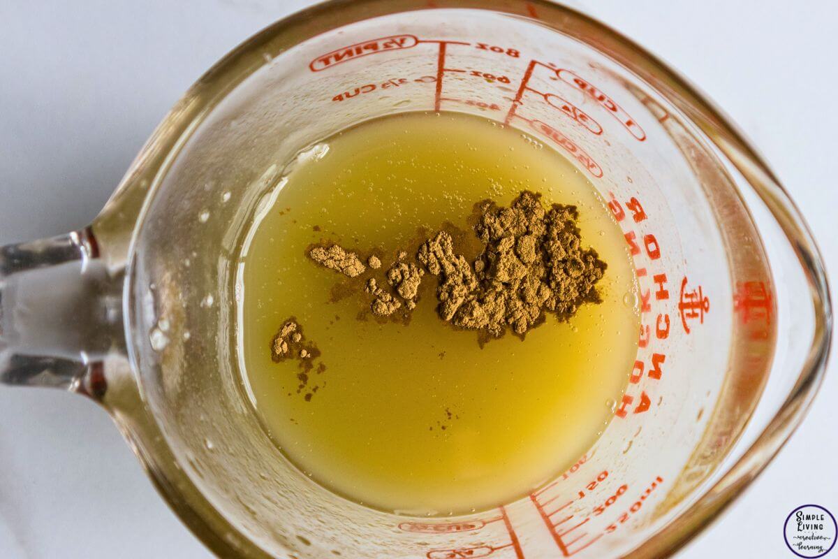 Homemade Tallow Deodorant Stick adding arrowroot powder and bentonite clay