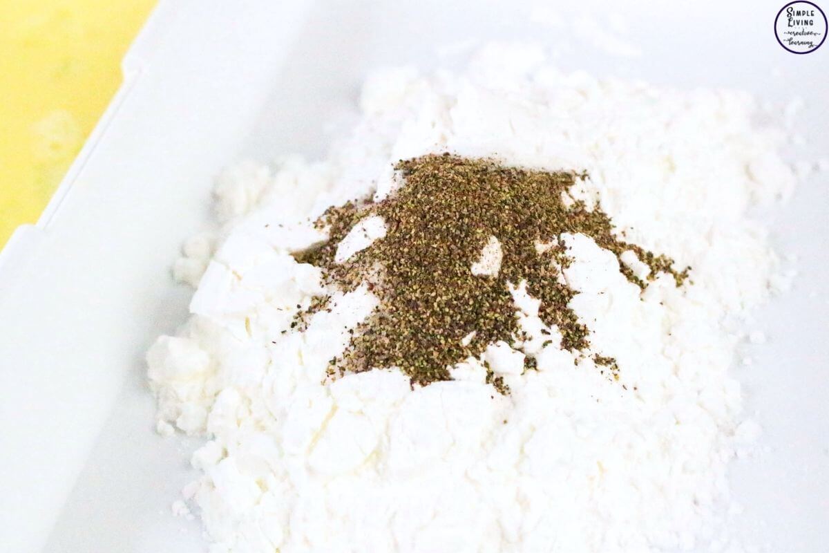 Orange Chicken Recipe mixing cornflour, salt and pepper
