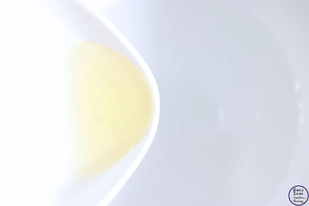 homemade degreaser spray adding the Castile soap