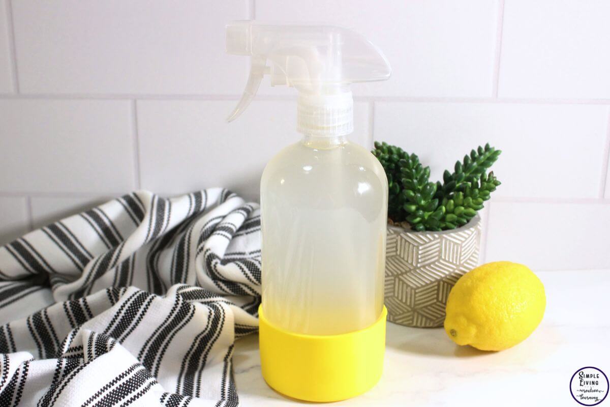 homemade degreaser spray in a glass spray bottle