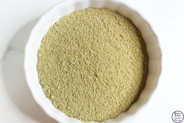 homemade scalp scrub grinding up rosemary