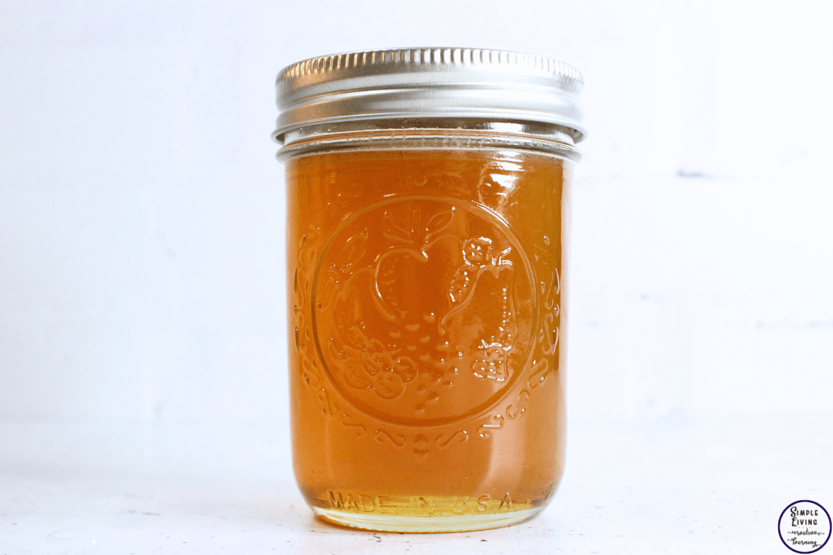 Thyme Cough Syrup in a jar with a lid on